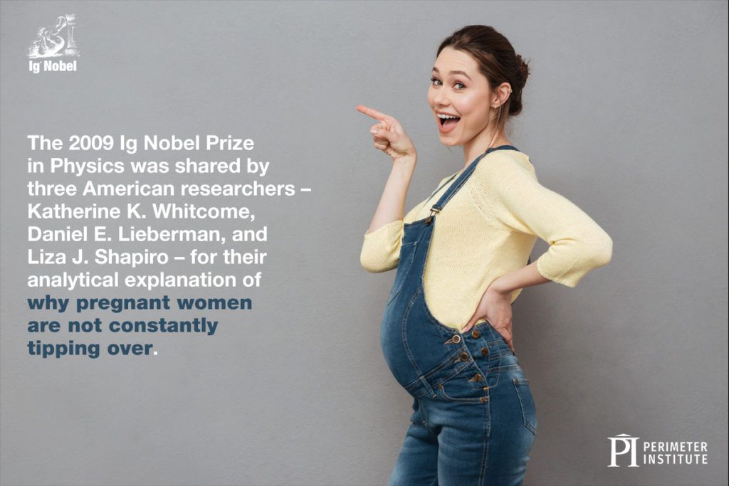 Side profile of a pregnant woman in overalls pointing to her right