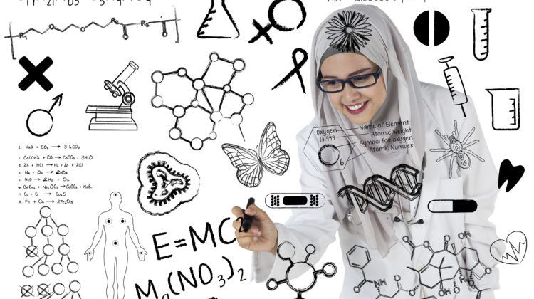 Woman scientist writes research formulas
