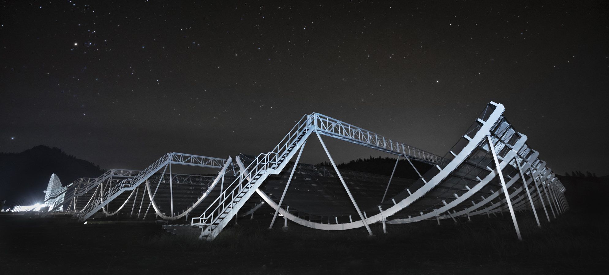 Massive telescope under a starry sky